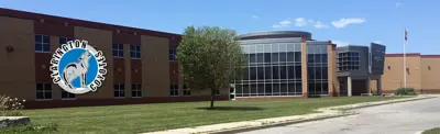 exterior picture of Clarington Central Intermediate School and their logo