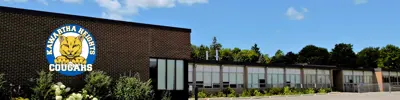 exterior picture of Kawartha Heights Public School and their logo