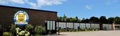 exterior picture of Kawartha Heights Public School and their logo
