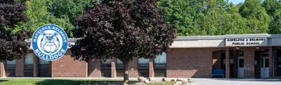 exterior picture of Havelock-Belmont Public School and their logo