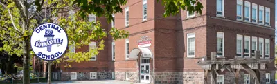 exterior picture of Central Public School with their logo