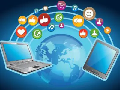 a computer and a laptop exchanging information