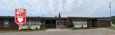 exterior picture of Camborne Public School and their logo