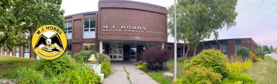 exterior picture of M.J. Hobbs Senior Public School and their logo