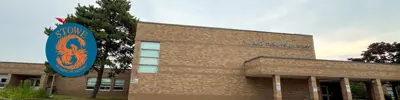 exterior picture of Dr. Emily Stowe Public School and their logo