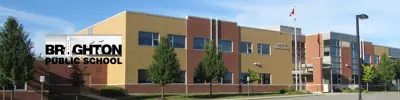 exterior picture of Brighton Public School and their logo